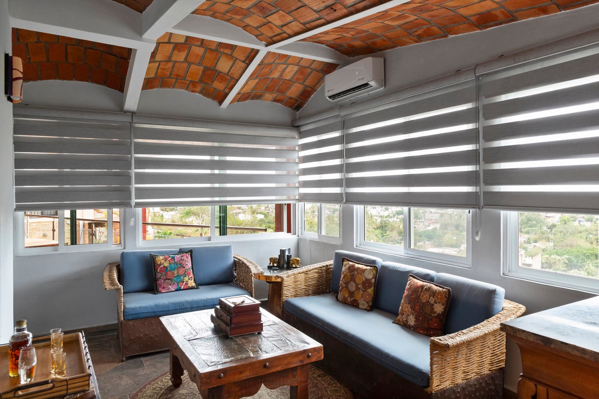 Cozy seating area with view to outdoor terrace